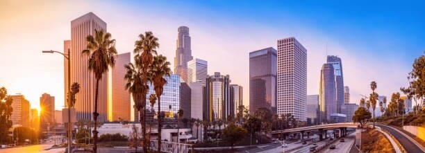 Los Angeles skyline with digital compliance overlay.
