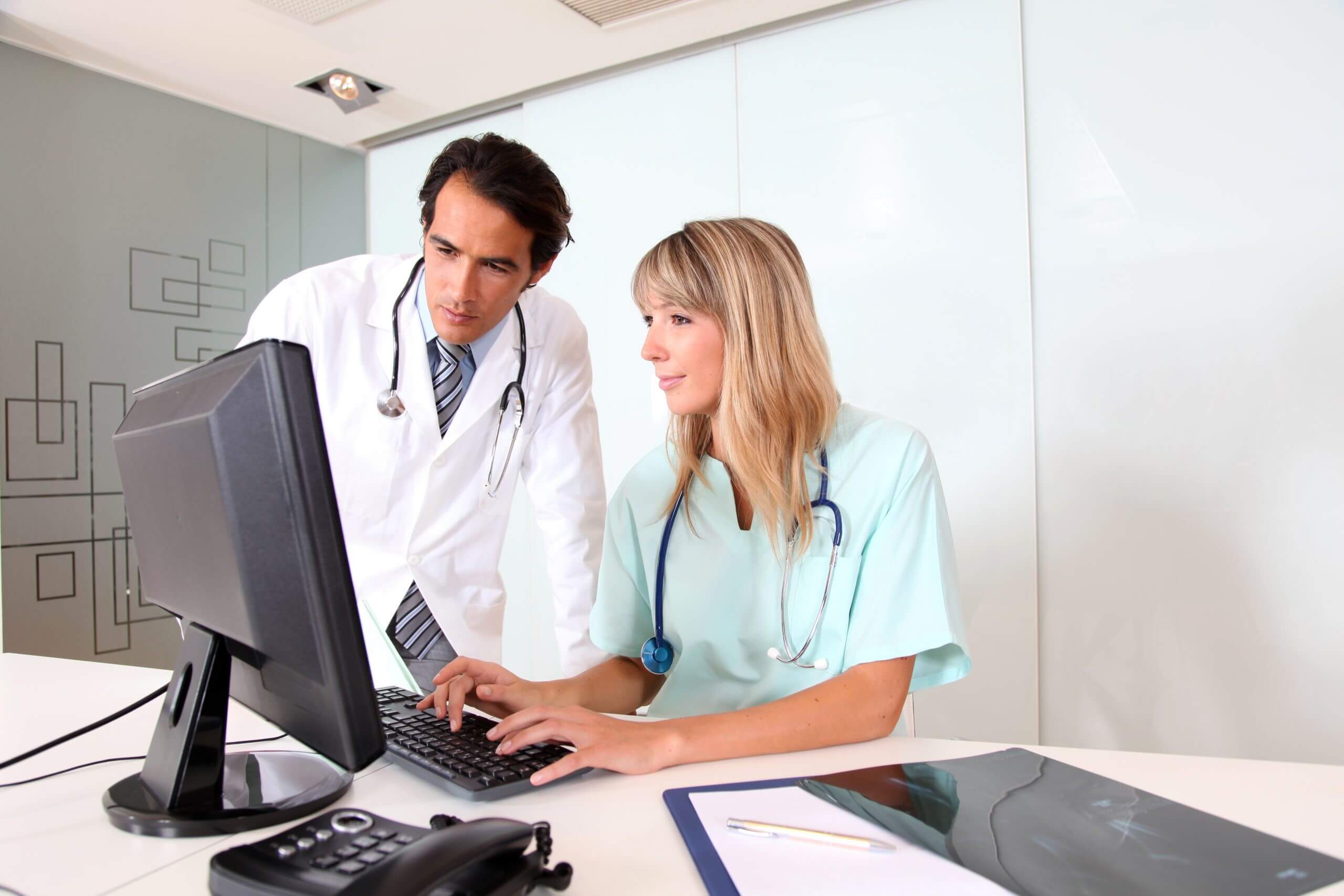Technician validating a healthcare compliance stack in Los Angeles.